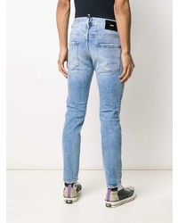 hellblaue enge Jeans mit Destroyed-Effekten von DSQUARED2