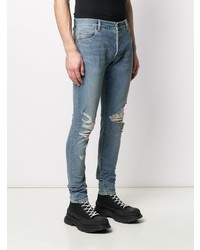 hellblaue enge Jeans mit Destroyed-Effekten von Balmain