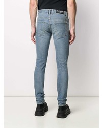 hellblaue enge Jeans mit Destroyed-Effekten von Balmain