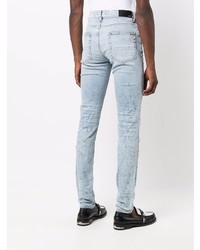 hellblaue enge Jeans mit Destroyed-Effekten von Amiri