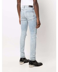 hellblaue enge Jeans mit Destroyed-Effekten von Amiri