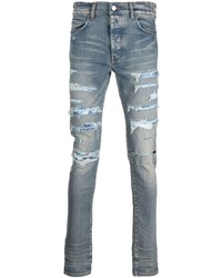 hellblaue enge Jeans mit Destroyed-Effekten von Amiri