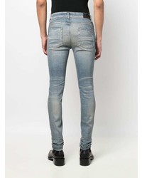 hellblaue enge Jeans mit Destroyed-Effekten von Amiri