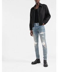 hellblaue enge Jeans mit Destroyed-Effekten von Amiri