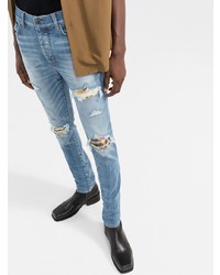 hellblaue enge Jeans mit Destroyed-Effekten von Amiri