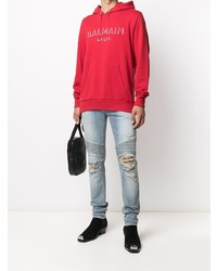 hellblaue enge Jeans mit Destroyed-Effekten von Balmain