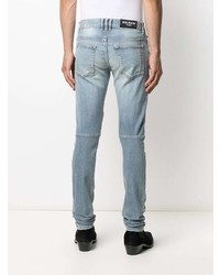 hellblaue enge Jeans mit Destroyed-Effekten von Balmain