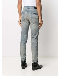 hellblaue enge Jeans mit Destroyed-Effekten von Amiri