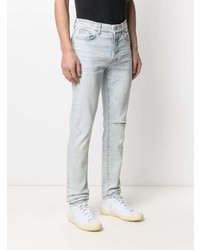 hellblaue enge Jeans mit Destroyed-Effekten von Amiri