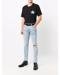 hellblaue enge Jeans mit Destroyed-Effekten von Amiri