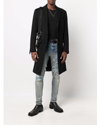 hellblaue enge Jeans mit Destroyed-Effekten von Amiri