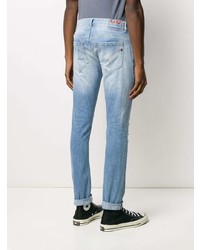 hellblaue enge Jeans mit Destroyed-Effekten von Dondup