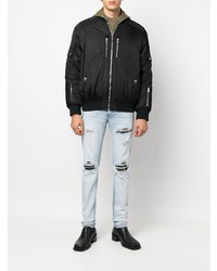 hellblaue enge Jeans mit Destroyed-Effekten von Amiri