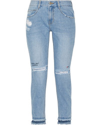 hellblaue enge Jeans mit Destroyed-Effekten