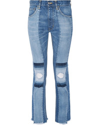hellblaue enge Jeans mit Destroyed-Effekten von Facetasm