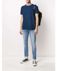 hellblaue enge Jeans mit Destroyed-Effekten von Dondup