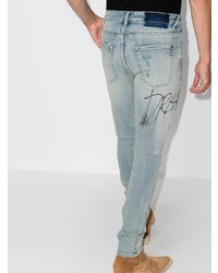 hellblaue enge Jeans mit Destroyed-Effekten von Ksubi