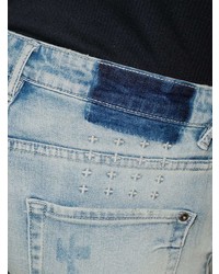 hellblaue enge Jeans mit Destroyed-Effekten von Ksubi