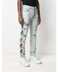 hellblaue enge Jeans mit Destroyed-Effekten von Amiri