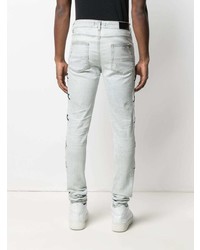 hellblaue enge Jeans mit Destroyed-Effekten von Amiri