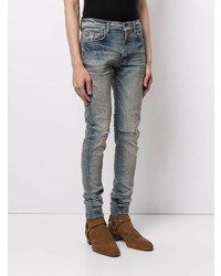 hellblaue enge Jeans mit Destroyed-Effekten von Amiri