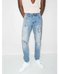 hellblaue enge Jeans mit Destroyed-Effekten von Neuw