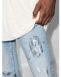 hellblaue enge Jeans mit Destroyed-Effekten von Neuw