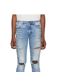 hellblaue enge Jeans mit Destroyed-Effekten von Amiri