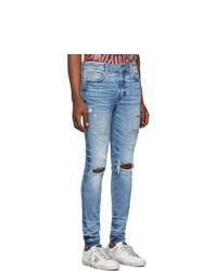 hellblaue enge Jeans mit Destroyed-Effekten von Amiri