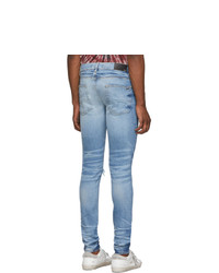 hellblaue enge Jeans mit Destroyed-Effekten von Amiri