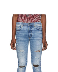 hellblaue enge Jeans mit Destroyed-Effekten von Amiri