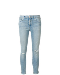 hellblaue enge Jeans mit Destroyed-Effekten von J Brand