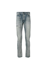 hellblaue enge Jeans mit Destroyed-Effekten von John Elliott