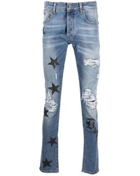 hellblaue enge Jeans mit Destroyed-Effekten von John Richmond