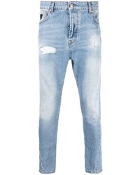 hellblaue enge Jeans mit Destroyed-Effekten von John Richmond