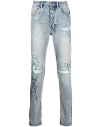 hellblaue enge Jeans mit Destroyed-Effekten von Ksubi