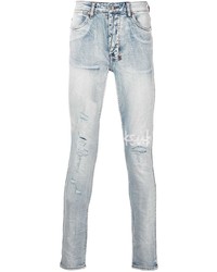 hellblaue enge Jeans mit Destroyed-Effekten von Ksubi