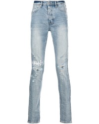 hellblaue enge Jeans mit Destroyed-Effekten von Ksubi