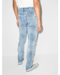 hellblaue enge Jeans mit Destroyed-Effekten von Ksubi