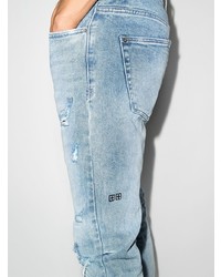 hellblaue enge Jeans mit Destroyed-Effekten von Ksubi