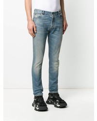 hellblaue enge Jeans mit Destroyed-Effekten von Balmain