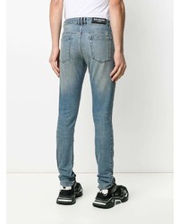 hellblaue enge Jeans mit Destroyed-Effekten von Balmain