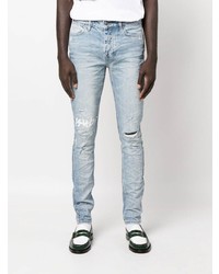 hellblaue enge Jeans mit Destroyed-Effekten von Ksubi