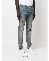 hellblaue enge Jeans mit Destroyed-Effekten von Amiri