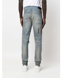 hellblaue enge Jeans mit Destroyed-Effekten von Amiri