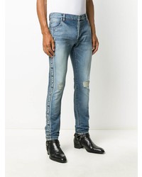 hellblaue enge Jeans mit Destroyed-Effekten von Balmain