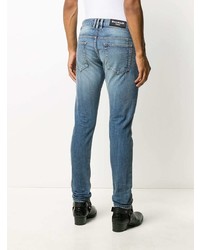 hellblaue enge Jeans mit Destroyed-Effekten von Balmain