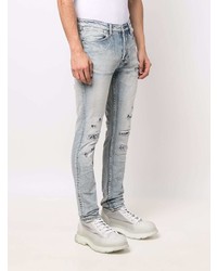 hellblaue enge Jeans mit Destroyed-Effekten von Ksubi