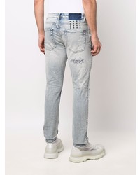 hellblaue enge Jeans mit Destroyed-Effekten von Ksubi