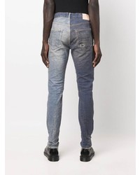 hellblaue enge Jeans mit Destroyed-Effekten von purple brand